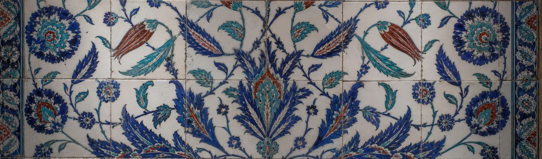 Band of glazed tiles painted with saz leaves, rosettes and tulips